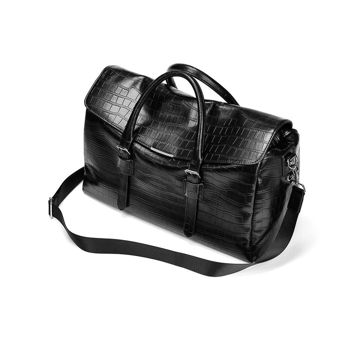 Black embossed crocodile travel bag with strap