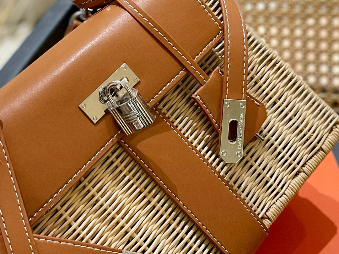 Brown leather handbag with gold lock on a woven surface