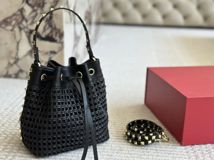 Boho raffia bag with adjustable studded strap