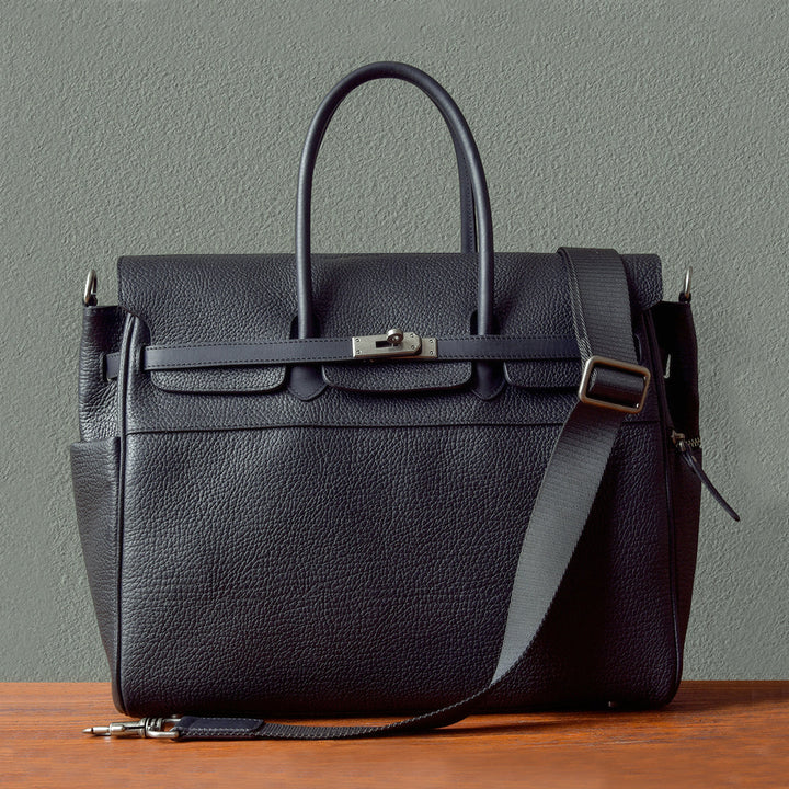 pebbled leather artisan work bag with silver hardware and shoulder strap