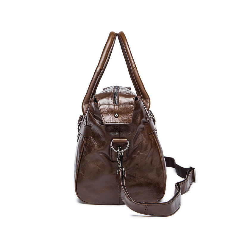 Vintage style brown leather holdall with belt