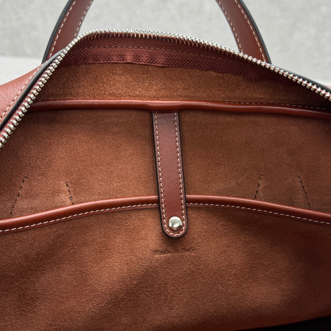 Timeless black leather carryall everyday bag