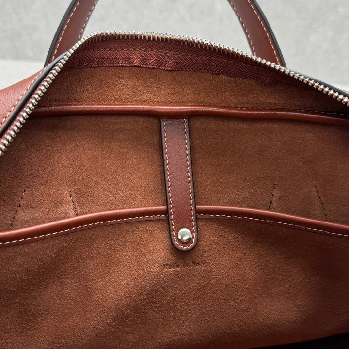 Timeless black leather carryall everyday bag