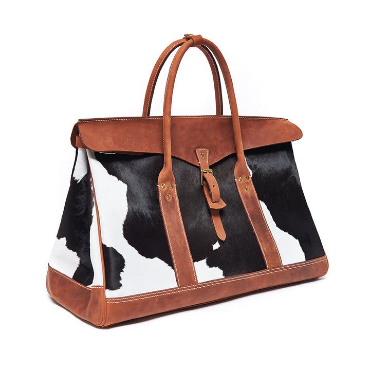 Large cowhide travel tote with structured base