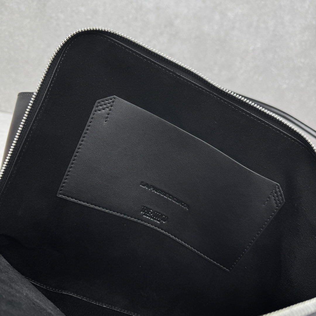Structured black leather arc bag for women
