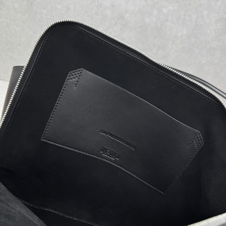 Structured black leather arc bag for women