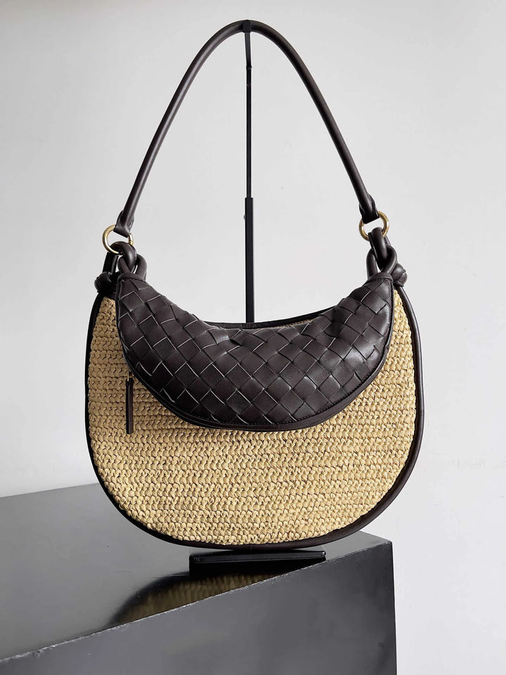 Natural raffia bag with black intrecciato leather