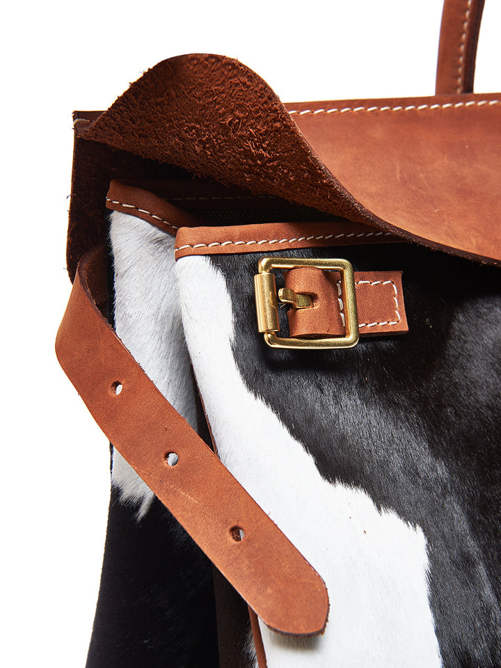 Calf hair leather bag with contrast stitching