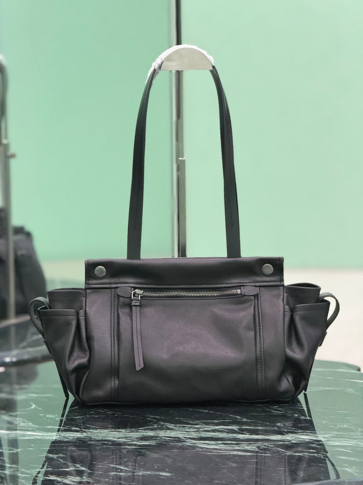 Classic black leather bag with utility pockets