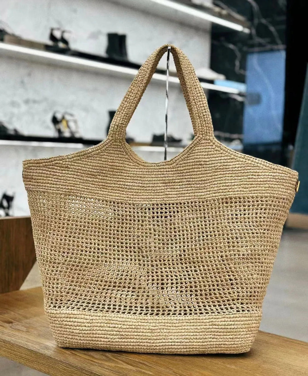 Open weave raffia bag detail
