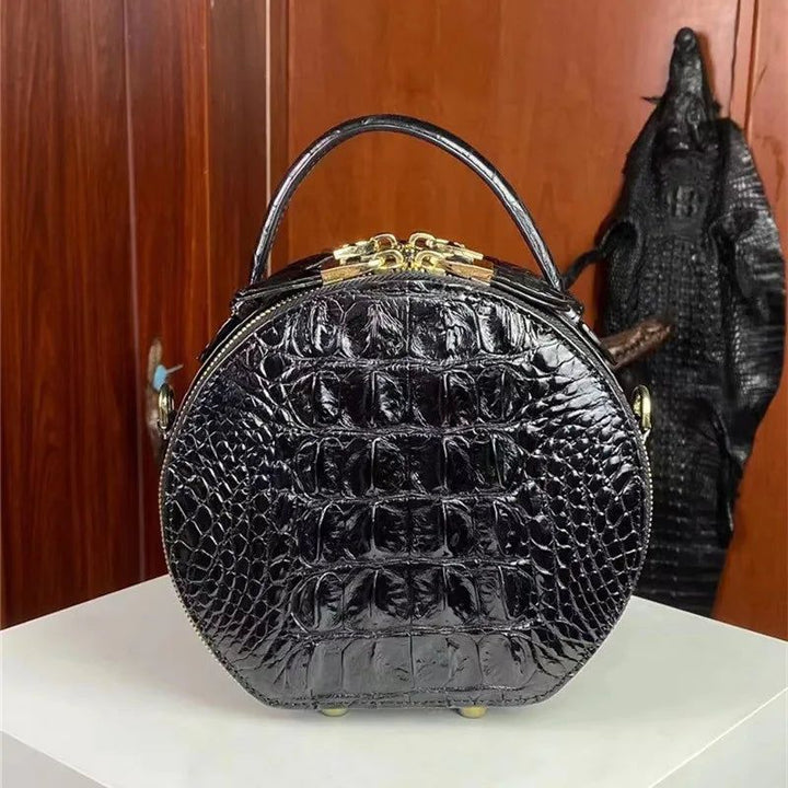 Round croc leather bag interior view with head layer cowhide lining