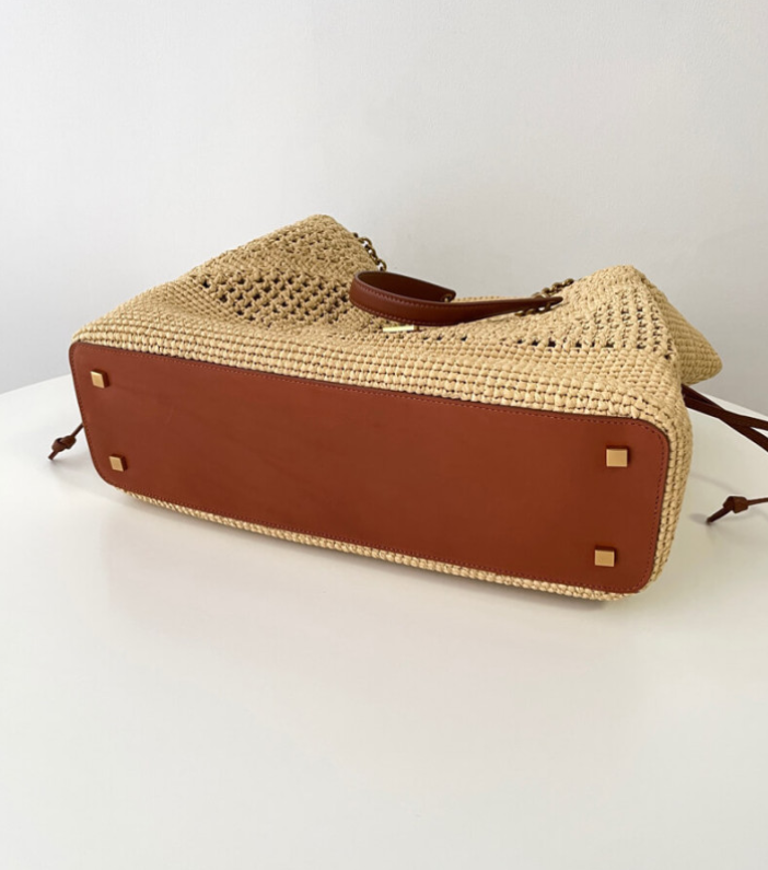 Large natural raffia bag with gold chain shoulder strap