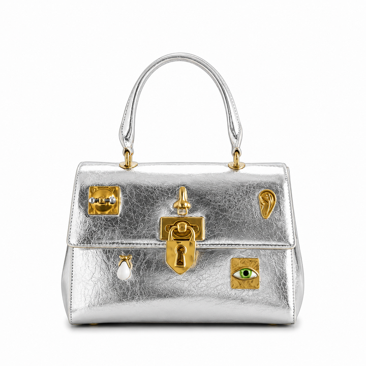 The Sculpted Hardware Top Handle Bag