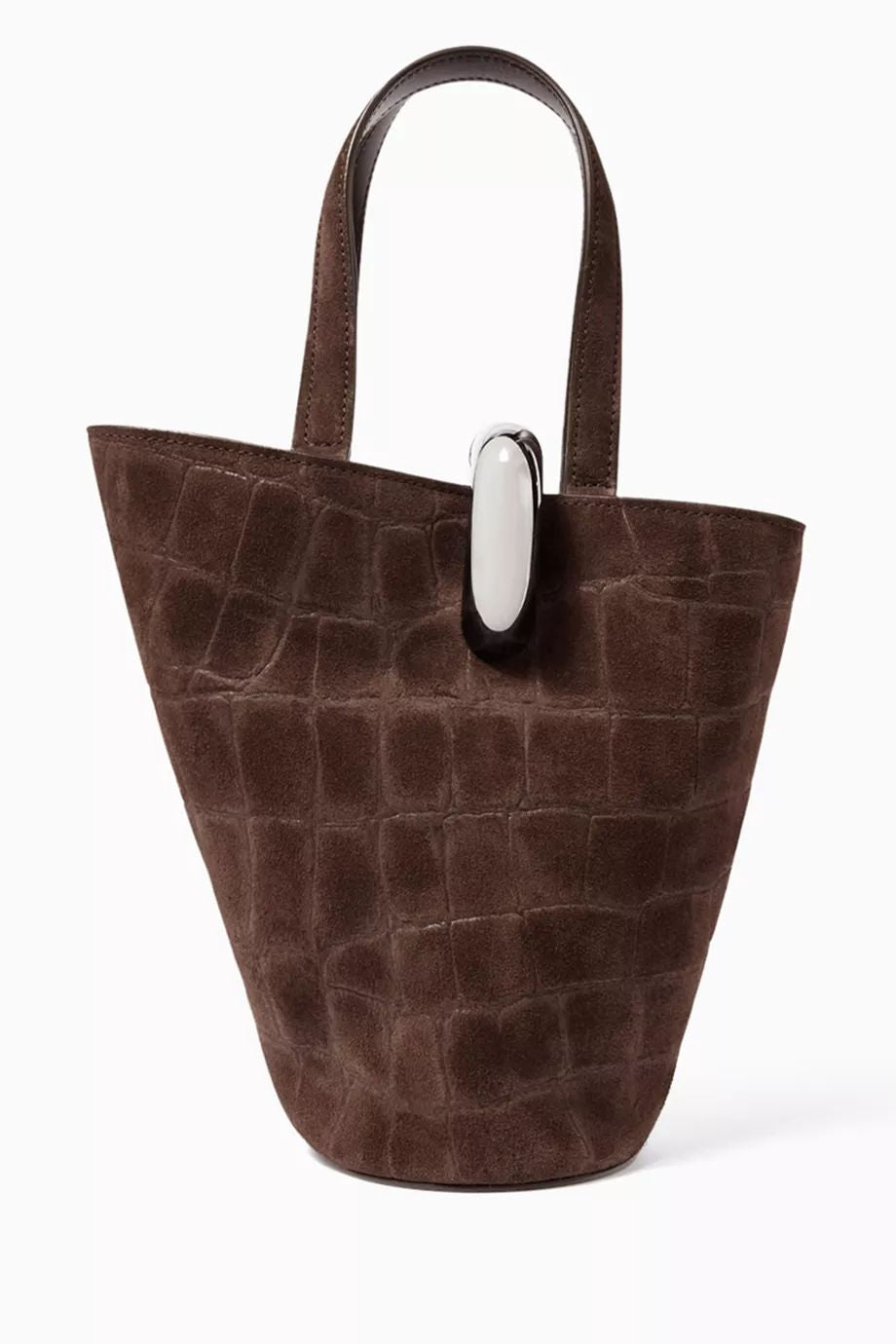 Black croc suede asymmetric bucket bag with gold metal ring clasp on wooden bench