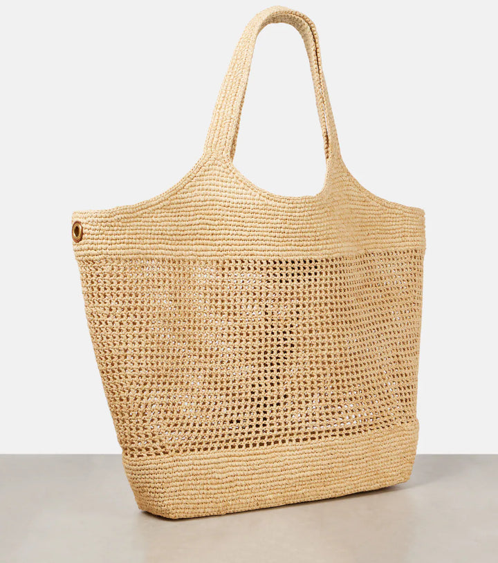 Oversized handwoven raffia tote bag with open weave design