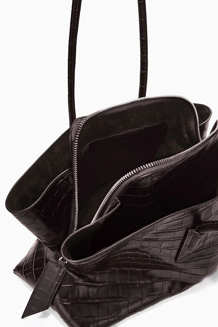 Sculptural croc-effect leather shoulder tote with asymmetric draped silhouette