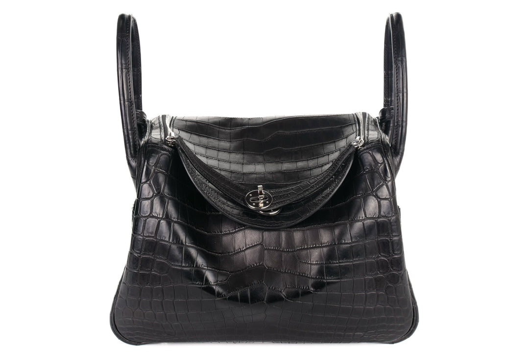 Luxury black crocodile leather Lindy tote bag with silver palladium turn-lock closure