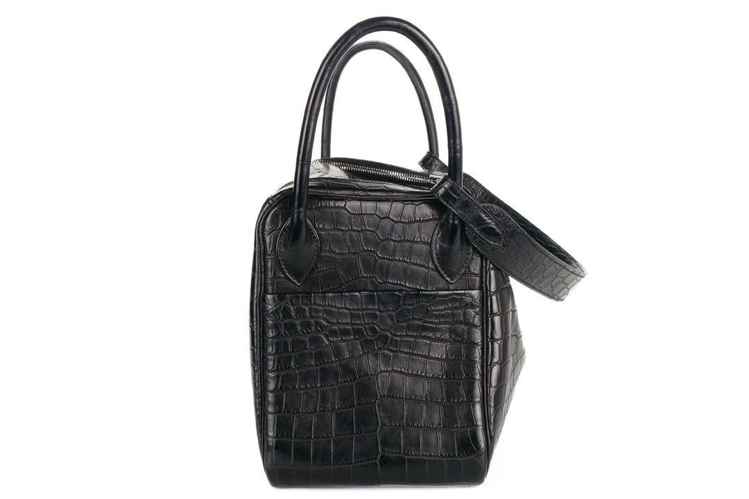 Black matte crocodile handbag palladium hardware close up detail shot