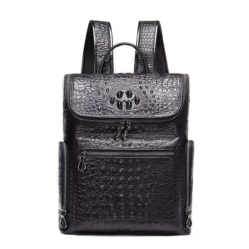 Croc-embossed cowhide backpack side view showing arcuate shoulder straps and zip side pocket
