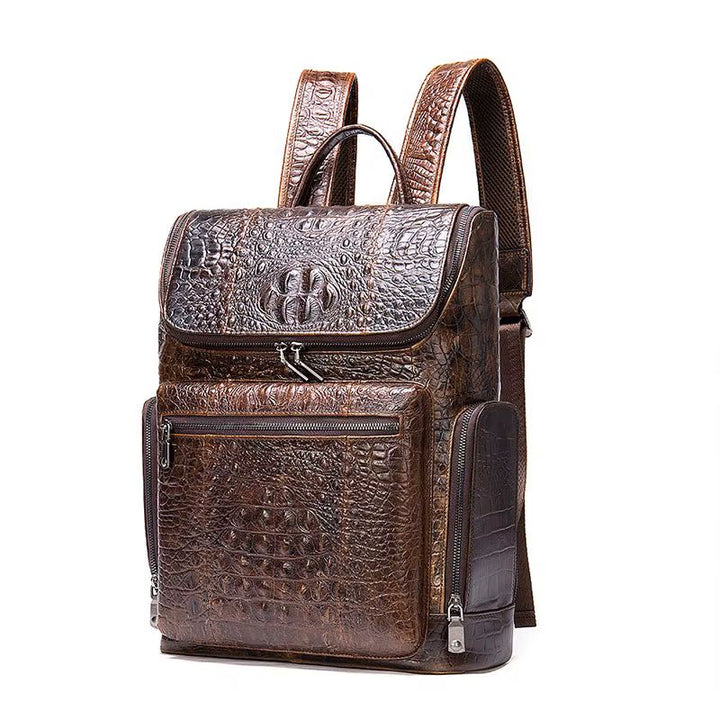 Genuine leather alligator-pattern backpack angle view highlighting deep scale texture throughout
