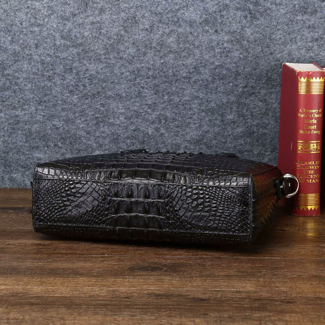 Croc-embossed leather top handle bag angle view highlighting deep scale texture and tall silhouette
