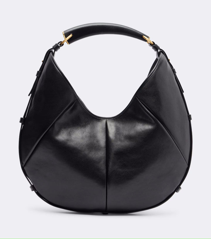 A black leather hobo handbag with gold-tone hardware, shown against a light gray background.