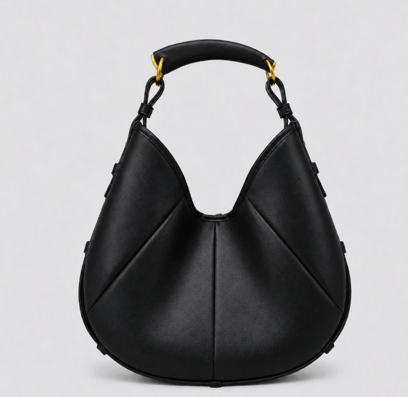 A black pebbled leather hobo handbag with a curved top handle, gold-tone hardware, and a subtle stitched geometric pattern, shown against a light gray background.