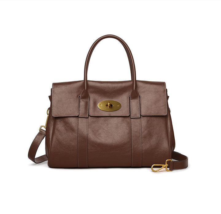 Large genuine leather tote bag front view with signature gold lock closure
