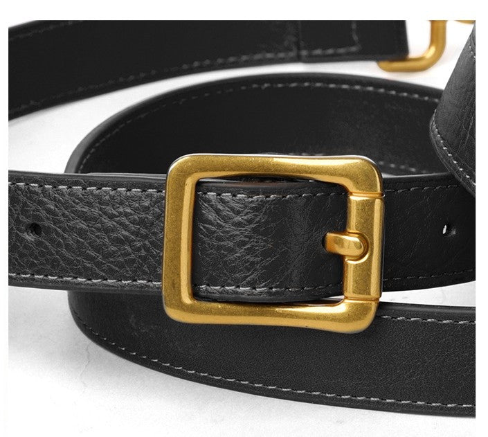 Black leather belt with a gold buckle on a white background