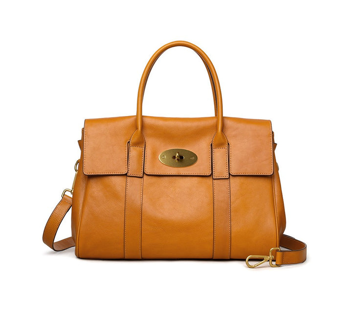 First layer cowhide tote bag side view showing depth and structured silhouette