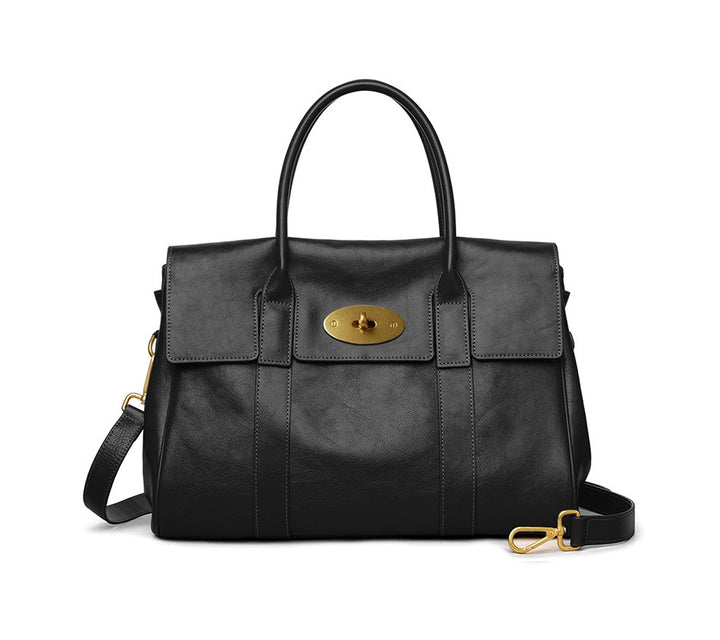 Luxury leather structured tote interior zip pocket and phone compartment detail