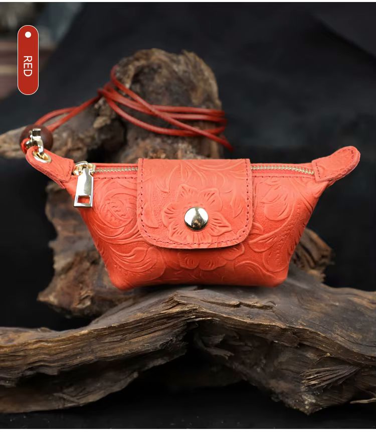 Namrico handmade leather mini crossbody pouch close-up of floral relief pattern on red leather