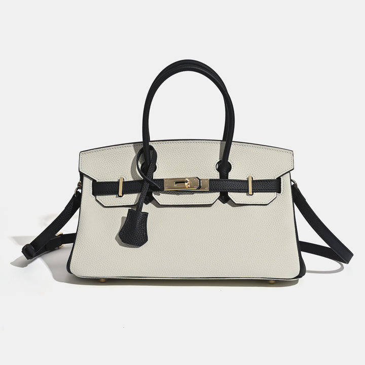 Tan pebbled leather structured bag back view with clean horizontal square silhouette