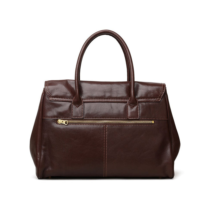 Large capacity genuine cowhide tote bag in black with gold turn-lock closure