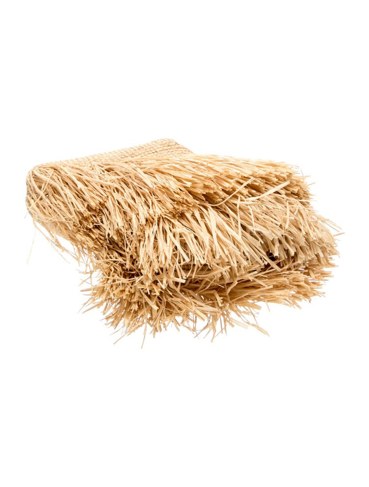 Rolled-up straw mat on a white background