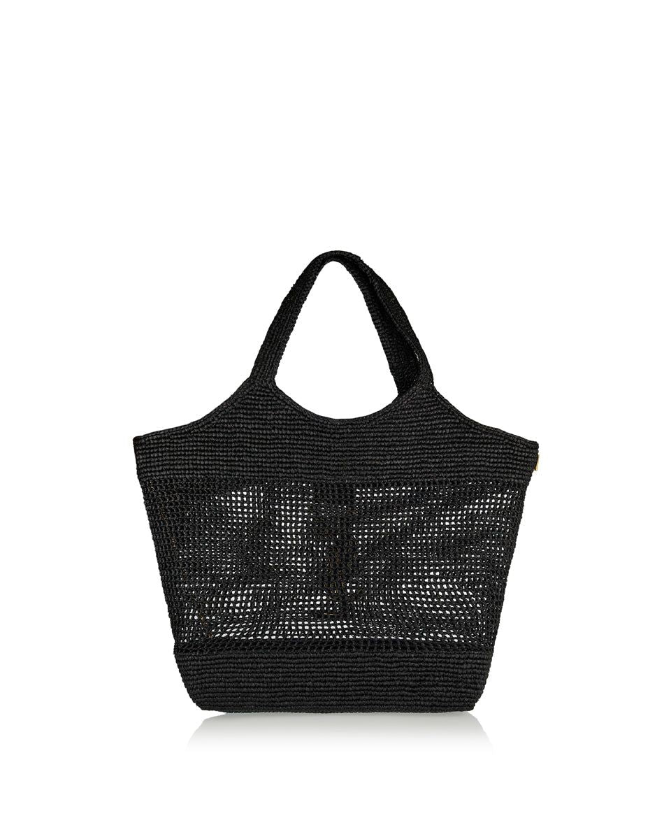Luxury artisan woven raffia tote bag bronze hardware close up detail