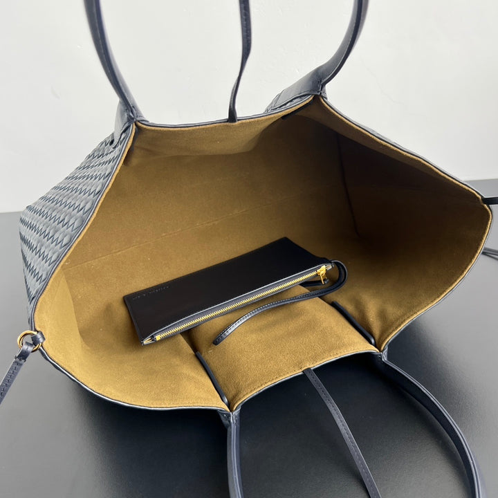 Genuine leather intrecciato woven tote bag interior view with spacious main compartment