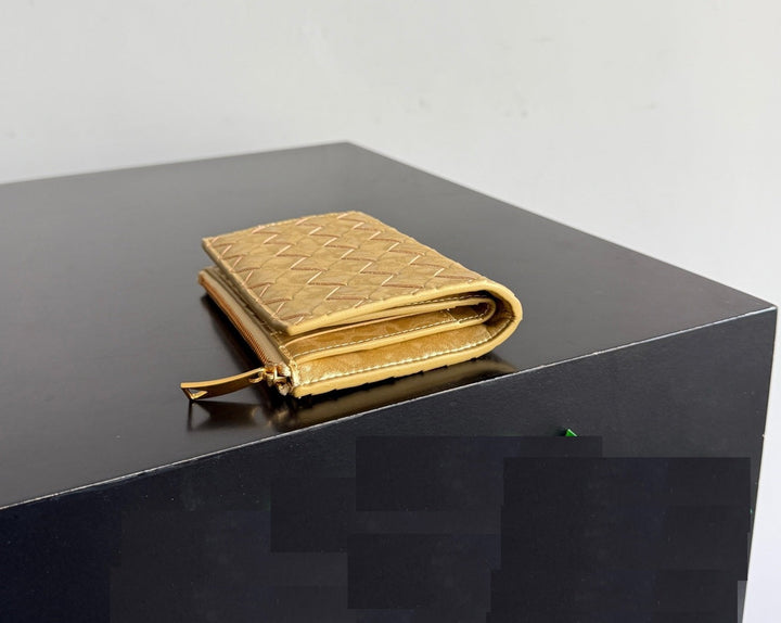 Compact gold leather wallet with zip closure