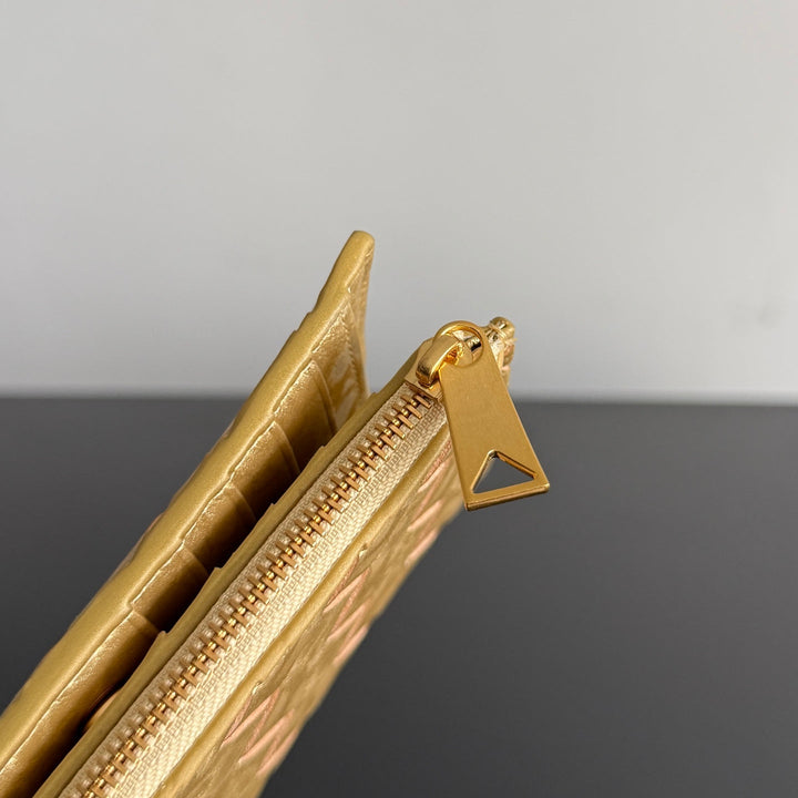 Mini woven gold wallet with gold zip hardware