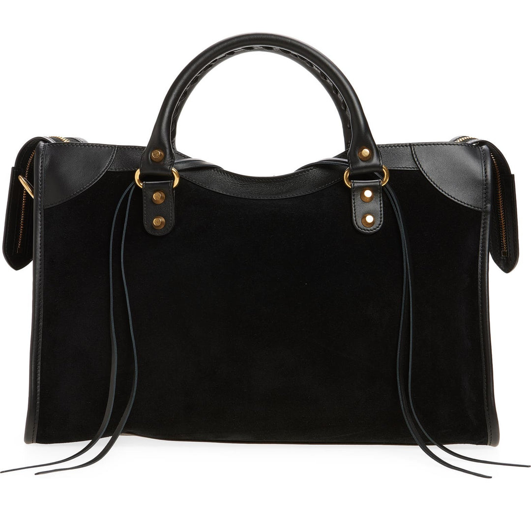 Le City medium tote side view showing suede body and leather corner trim details
