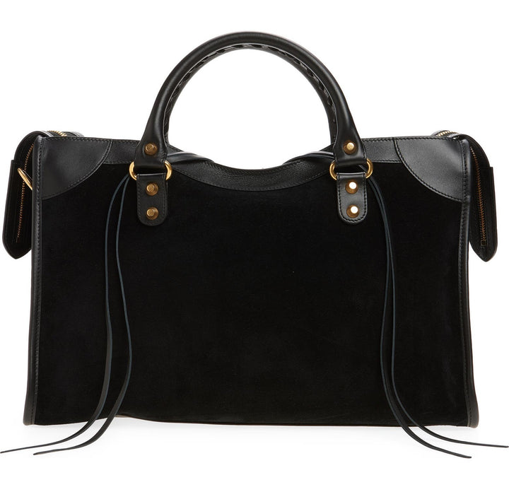 Le City medium tote side view showing suede body and leather corner trim details
