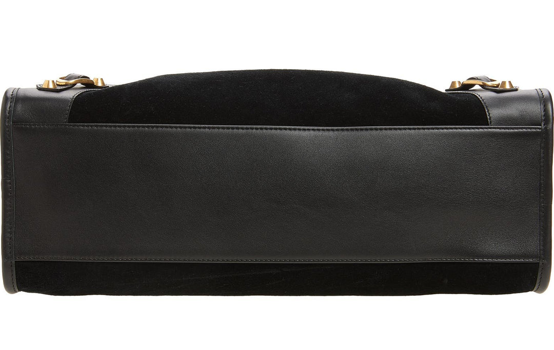 Black suede tote bag with two-way zipper top open showing spacious interior

