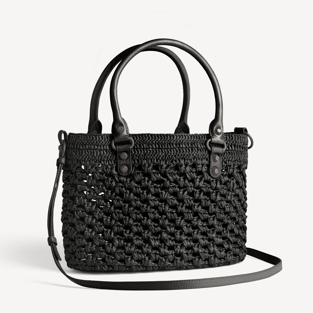 Open weave raffia bag top view showing interior slip pocket and roomy main compartment