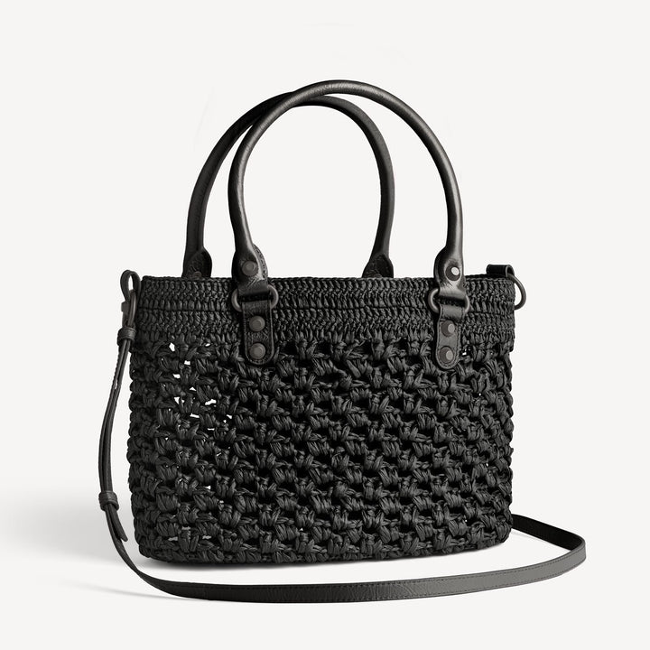 Open weave raffia bag top view showing interior slip pocket and roomy main compartment