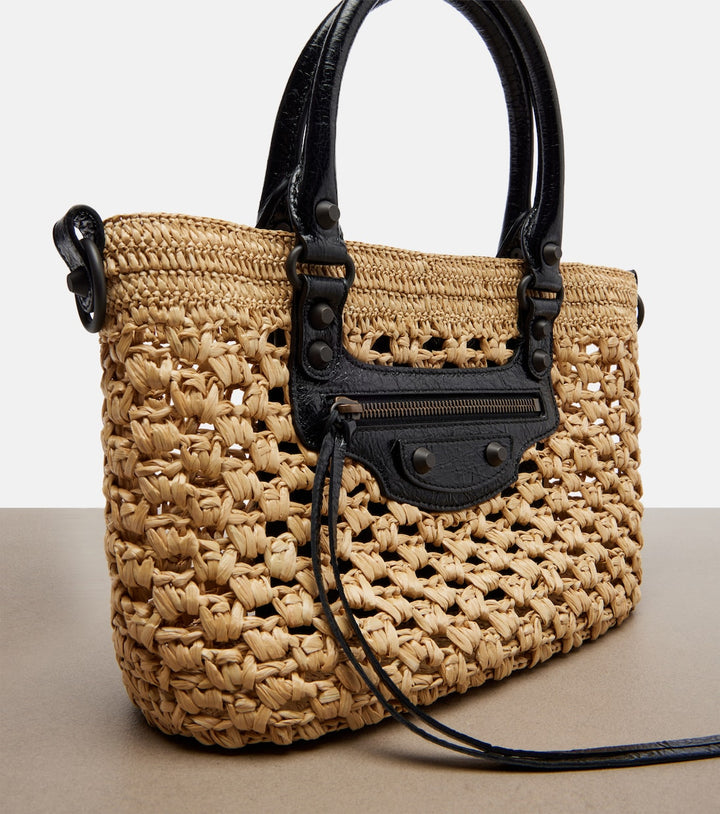 Namrico Le City raffia bag close-up detail of leather trim and rolled strap attachment