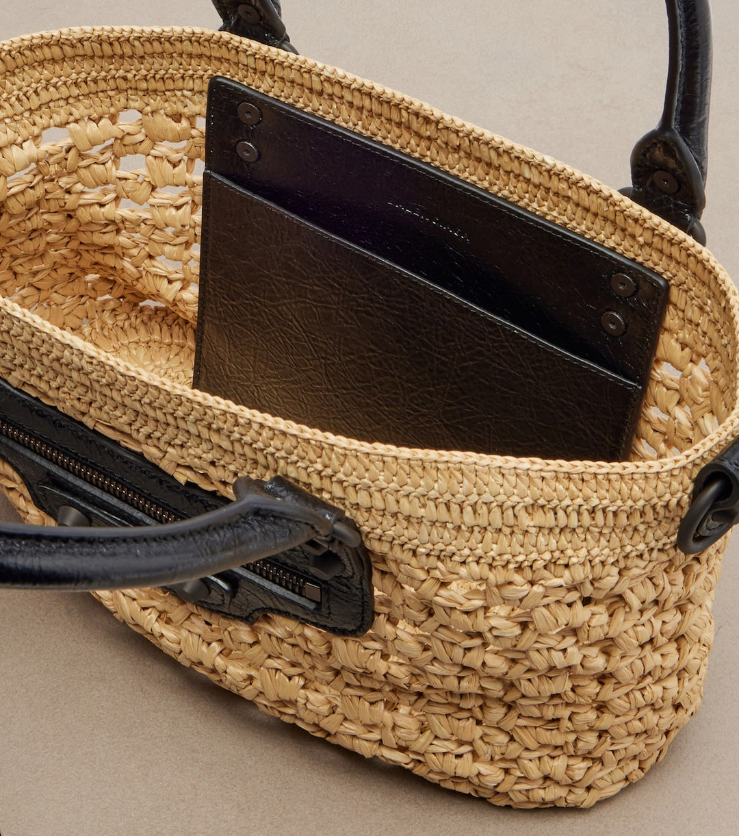 Le City raffia bag exterior zip pocket close-up detail with leather surrounding panel