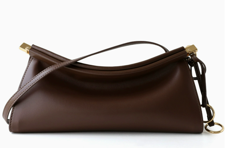 A dark brown leather shoulder bag with a slouchy crescent shape, featuring gold-tone hardware and a matching shoulder strap, set against a plain white background.