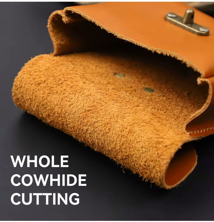 Three leather belt pouches overhead flat lay on dark grey surface showing color range