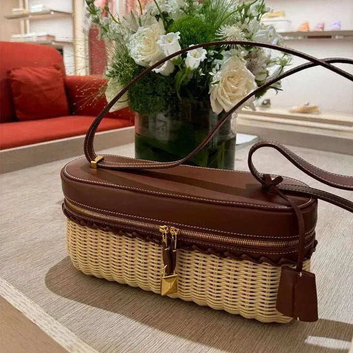 Luxury wicker box bag with cognac leather top and adjustable shoulder strap