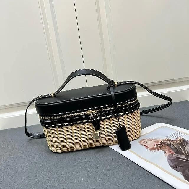 Natural straw rattan box bag with gold zipper and whipstitch leather edging